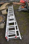 A CLIMA ALUMINIUM DOUBLE EXTENSION LADDER with nine rungs to each 251cm section along with a step