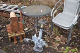 A MODERN GLASS TOPPED METAL GARDEN TABLE, two chairs, a plastic fairy lantern and a wooden garden