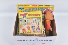 A COLLECTION OF RUPERT THE BEAR RELATED ITEMS, to include assorted jigsaws by Hope/Hestair, contents