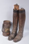 A PAIR OF BROWN MILITARY OR RIDING BOOTS complete with stretchers and a WWII 1944 dated leather shot