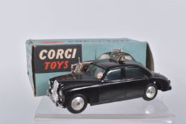 A BOXED CORGI TOYS RILEY PATHFINDER POLICE CAR, numbered 209, black body with silvered detail, metal