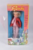 A BOXED SINDY DOLL, in a Exinmex Mexico box, wearing a red jacket, chequered red and white scarf and