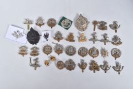 SMALL ACCUMULATION OF BRITISH CAP BADGES,DEVICES etc, over thirty in number and various Regiments