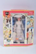 A BOXED PEDIGREE SINDY DRESSED FOR A ROYAL OCCASION DOLL, No.44660, appears complete with bonnet &