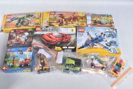 A COLLECTION OF BOXED AND UNBOXED LEGO MODELS, to include a Mythical Creatures 31073, opened, the