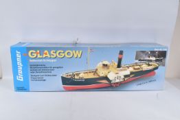 A PART BUILT GRAUPNER PADDLE WHEEL TUG 'GLASGOW' MODEL SHIP, reference 2126, plastic and wood