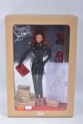 A BOXED MATTEL BARBIE COLLECTOR BARBIE BY CHRISTIAN LOUBOUTIN DOLL, No.N6599, appears complete and