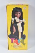 A BOXED 1976 IDEAL TARA DOLL, reference 1239-3, doll wearing yellow chequered yellow outfit