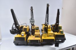 FIVE MIGHTY TONKA TOYS LORRY/TRUCK MOUNTED GRAB CRANES, all appear largely complete but in