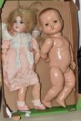 TWO VINTAGE DOLLS to include an Armand Marseille bisque headed doll marked '390' to the back of