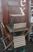 A FOLDING SQUARE TEAK GARDEN TABLE, 70cm squared x height 74cm, two matching chairs, along with a