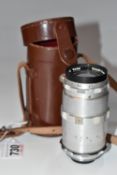 A CASED LORDOMAT LEIDOLF WETZLAR SCHACHT-TRAVENAR 1:4/135 LENS, in a brown leather case (1) (