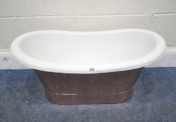 A SMALL COPPER AND ENAMEL BATH, possibly used as a show piece to provide an example of a larger
