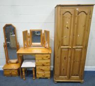 A SELECTION OF MODERN PINE BEDROOM FURNITURE, to include a double door wardrobe, width 77cm x