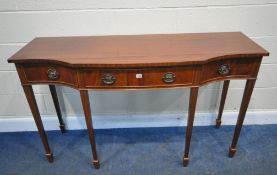 A REPRODUCTION MAHOGANY SERPENTINE SIDEBOARD, fitted with three frieze drawers, raised on square