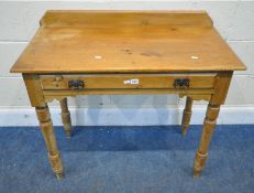 A 19TH CENTURY PINE SIDE TABLE, with a raised back, a single frieze drawer, raised on turned legs,