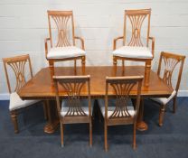 A LATE 20TH CENTURY EXTENDING DINING TABLE, with one additional leaf, extended length 210cm x closed