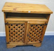 A MODERN PINE CABINET, with double slatted cupboard doors, width 90cm x depth 45cm x height 102cm,