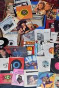A GROUP OF MOSTLY EIGHTIES/EARLY NINETIES 45RPM SINGLES to include a group of Elton John singles,