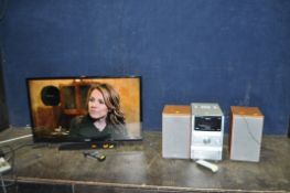 A PANASONIC TX-32D302B 32in TV WITH REMOTE, a Sony CMT-SPZ90DB hi fi and matching speakers (both PAT