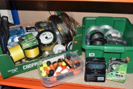 TWO BOXES OF FISHING ACCESSORIES, mostly sea fishing, to include wheels of wire leader, shock leader