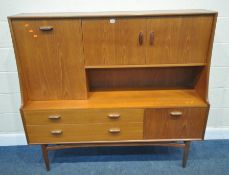 G PLAN, A MID CENTURY TEAK HIGHBOARD, fitted double cupboard doors, two sized fall front doors,