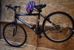 A SALCANO EXCEL UNISEX BIKE, with a 20 frame, and a cross helmet, condition report: rusted chair and