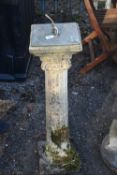 A WEATHERED SANDFORD STONE SUN DIAL, the dial reads all seasons on a Corinthian column support and