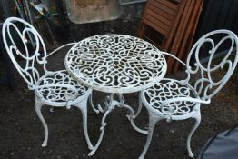 A WHITE PAINTED ALUMINIUM CIRCULAR GARDEN TABLE, diameter 62cm x height 70cm, and two chairs,