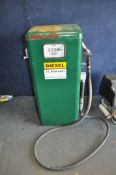 A MID-CENTURY TOKHEIM 2197 FUEL PUMP with pipe and nozzle, height 109cm. Condition Report: paint