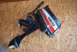 A YAMAHA 5HP 2-STROKE OUTBOARD MOTOR, condition report: untested and appears to need maintenance,