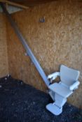 A HANDICARE MODEL 1100 STRAIGHT STAIRLIFT, length 386cm, with a 3amp fuse, untested