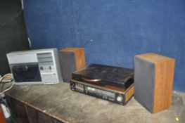 TWO VINTAGE HI-Fis, comprising a Sharp VZ-3500 linear tracking portable hi fi, and a Sanyo JXT-