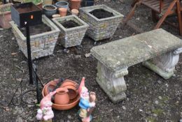 A WEATHERED COMPOSITE GARDEN BENCH, on twin scrolled supports, length 94cm, along with a