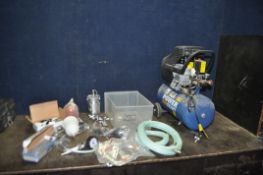 A POWERCRAFT PC270/08 AIR COMPRESSOR with a tray containing air tools including two spray guns, a