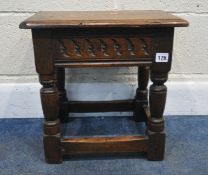 AN EARLY 20TH CENTURY OAK JOINT STOOL, with repeating geometric patterns, raised on block and turned
