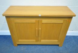 MORRIS FURNITURE, A MODERN OAK SIDEBOARD, fitted with double cupboard doors, length 121cm x depth