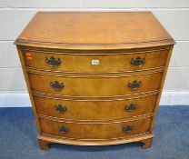 A REPRODUCTION GEORGIAN STYLE BOW FRONT CHEST OF FOUR DRAWERS, raised on bracket feet, width 78cm