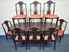 JOHN E COYLE, A LATE 20TH CENTURY OVAL EXTENDING DINING TABLE, with a single fold out leaf, raised