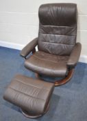 EKORNES STRESSLESS, A WIDE BROWN LEATHER SWIVEL RECLINING ARMCHAIR, width 84cm x depth 76cm x height