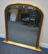 A LARGE GILT FRAME ARCHED OVERMANTEL MIRROR, with scrolled details, width 127cm x height 126cm,