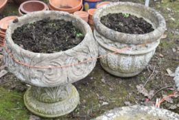 A WEATHERED COMPOSITE ACANTHUS LEAF PLANTER, on a separate base, diameter 43cm x height 44cm, and