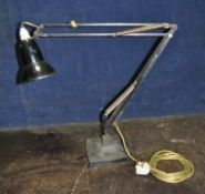 GEORGE CARWARDINE FOR ANGLE POISE A MID 20th CENTURY ARTICULATED DESK LAMP model 1208 with a