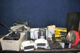 A COLLECTION OF HOUSEHOLD AND CYCLING EQUIPMENT including a Karcher window vac, a Pure radio, a