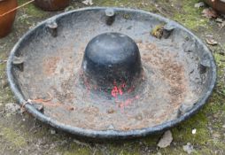 A CAST IRON MEXICAN HAT PIG FEEDER, diameter 74cm, condition report: overpainted