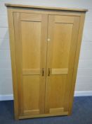 A MODERN OAK DOUBLE DOOR WARDROBE, width 120cm x depth 62cm x height 201cm condition report: