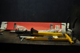 A SELECTION OF VEHICLE SECURITY AND CARRYING EQUIPMENT including a Erde motorcycle trailer skid (