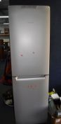 A HOTPOINT FF200E FRIDGE FREEZER width 60cm, depth 63cm, height 200cm (PAT pass and working at 3 and