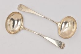 A PAIR OF GEORGE IV OLD ENGLISH PATTERN SAUCE LADLES, each with engraved monogram to the handles,
