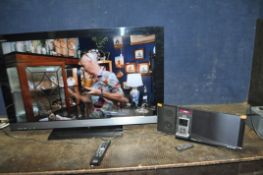 A SONY KDL-40EX503 40in TV WITH REMOTE, a Panasonic SC-HC57DB Hi Fi with remote and an iPod 160Gb (